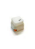 Keylight Mini one-press desk lamp in cream color with orange side switch