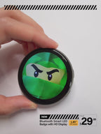 Bluetooth wearable digital badge showing custom GIF at trade show