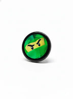 Smart LED badge showing green ninja pixel art on a round digital display