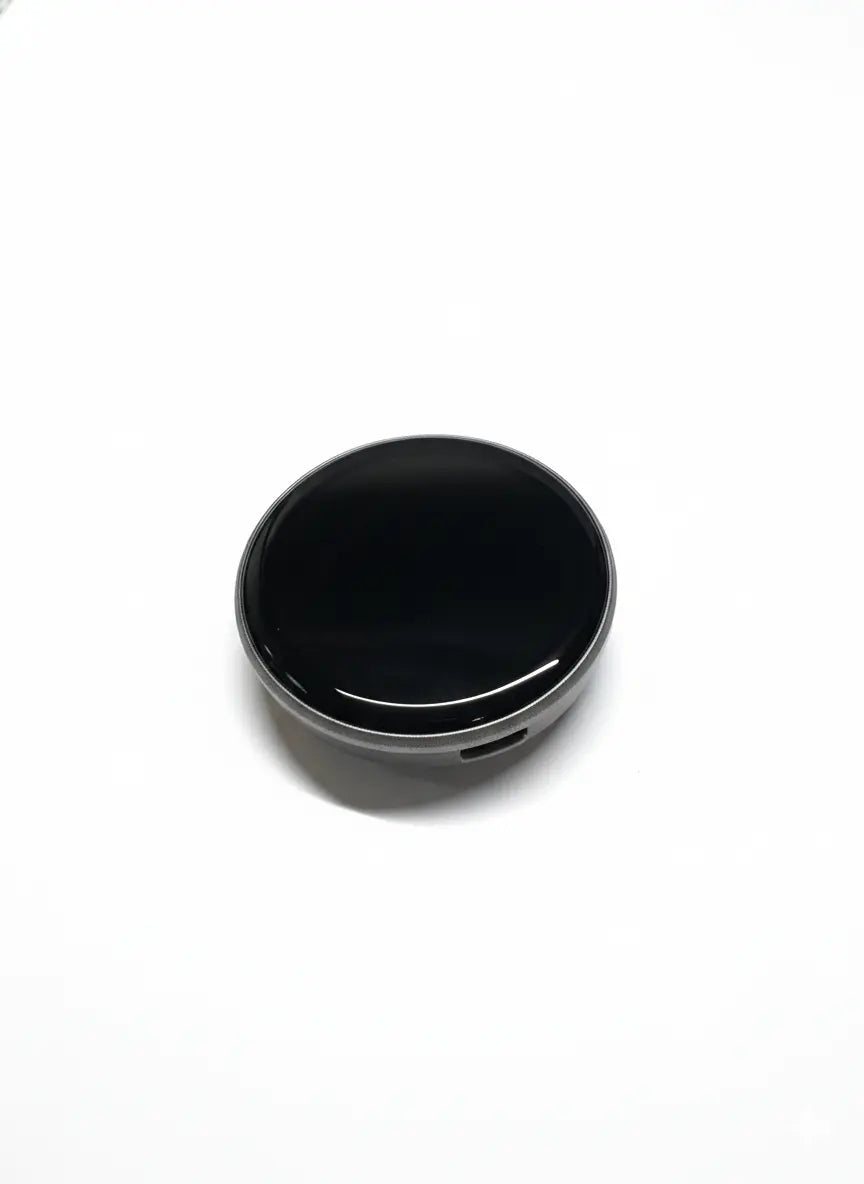 Smart LED badge round display in black with screen turned off