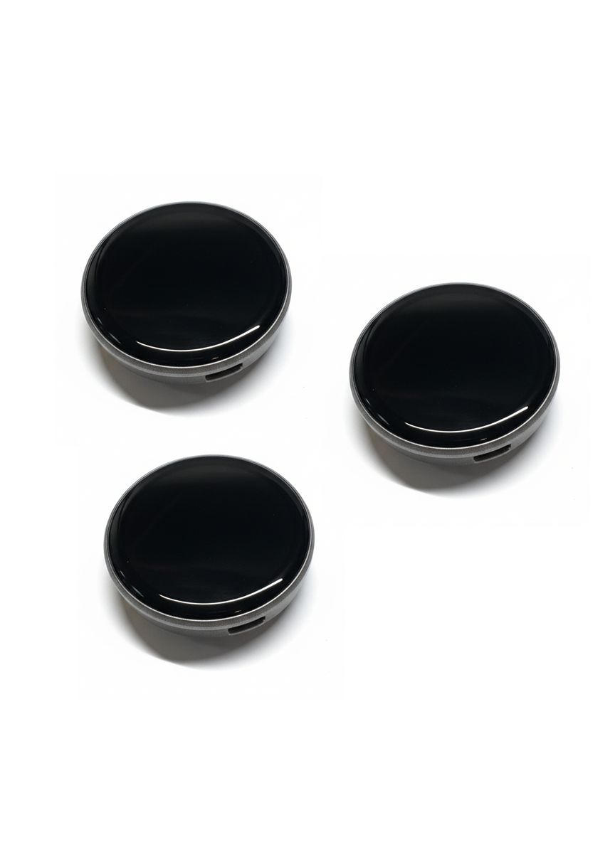 Three black smart LED badges with programmable round displays