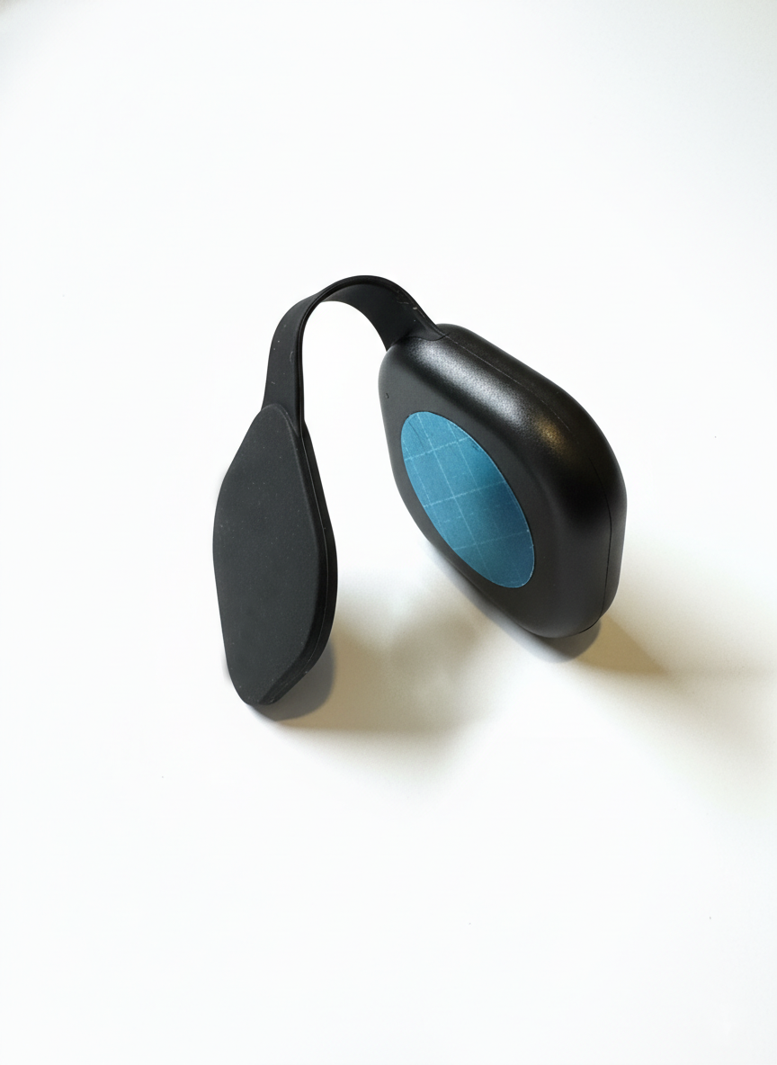 Wearable magnetic clip flashlight showing magnetic back plate for hands-free use